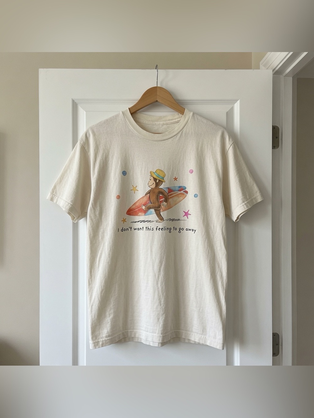 Curious George Surfing I Don’t Want This Feeling Cream Graphic T-Shirt